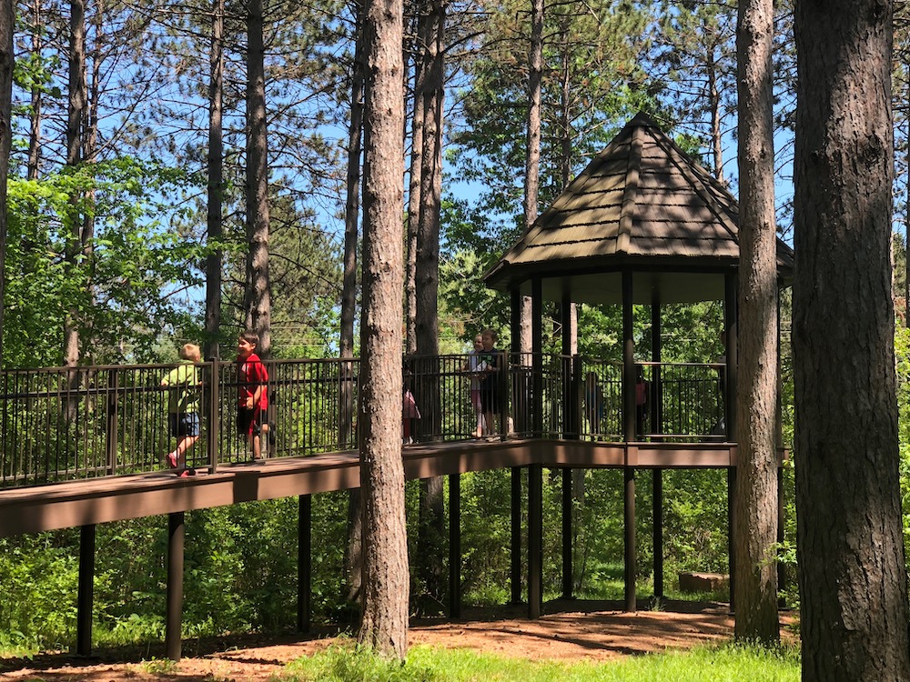 Treehouse with kids on ramp